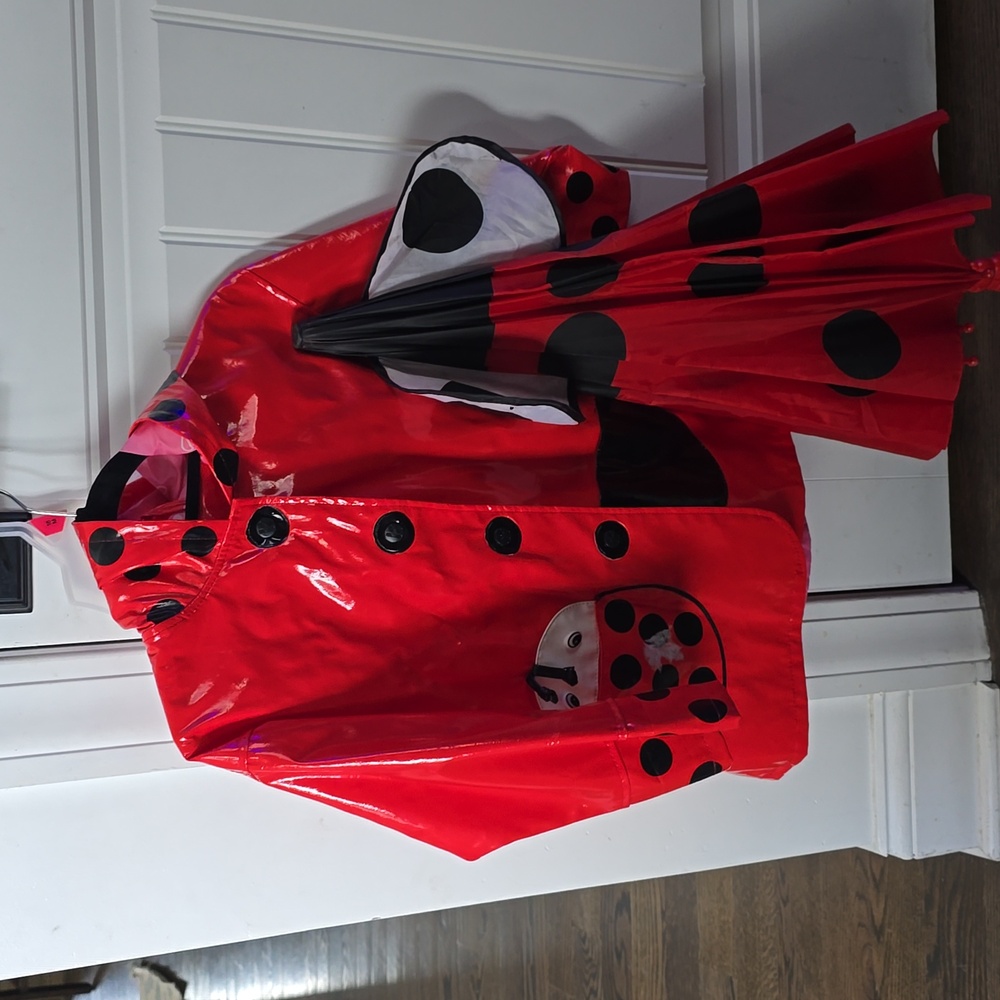 Rain coat with umbrella